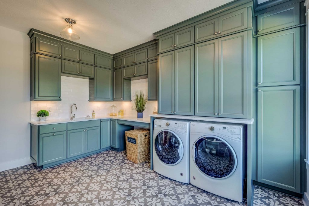 laundry room turquoise green cabinets