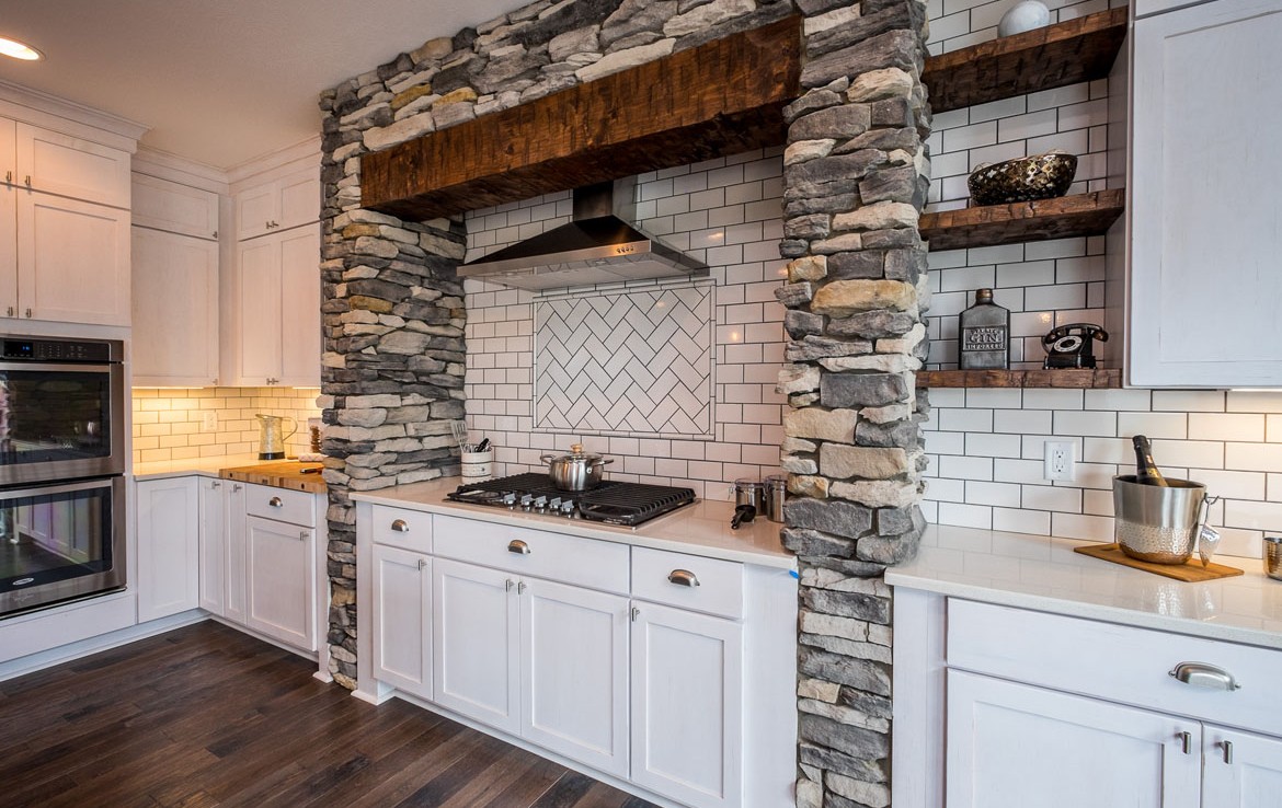 aspen luxury home kitchen stone work– Infinity Custom Homes