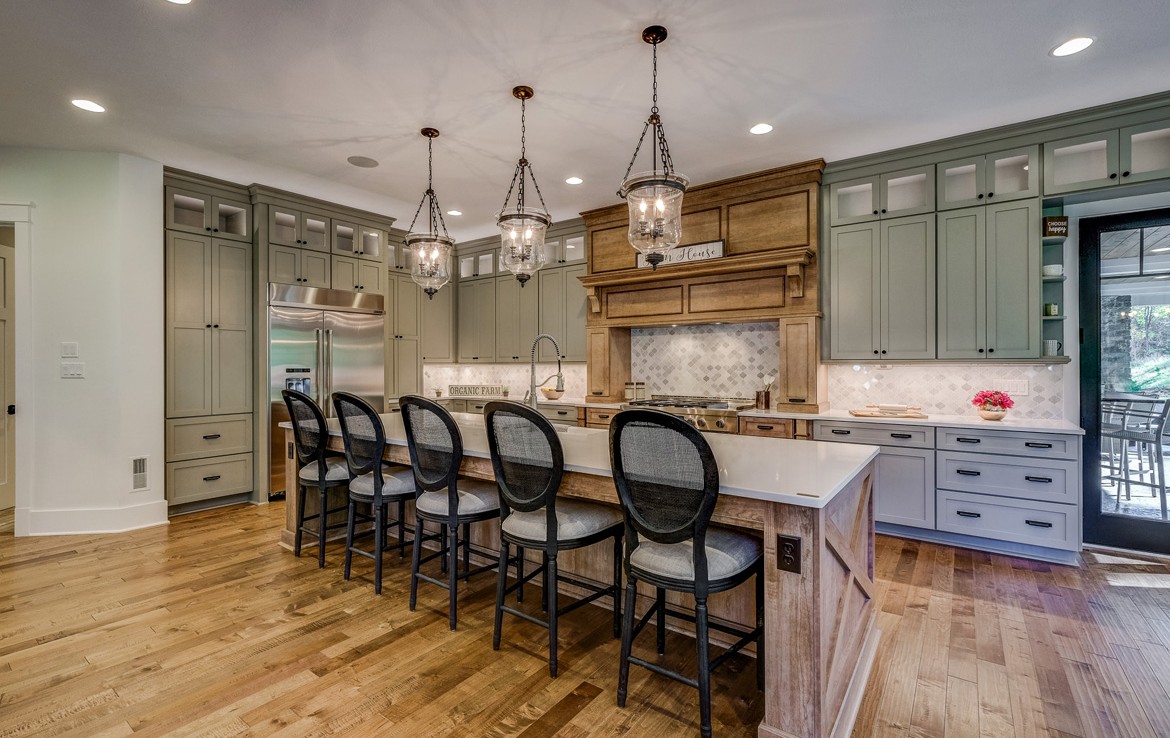 austin luxury home french country style kitchen with island – Infinity Custom Homes