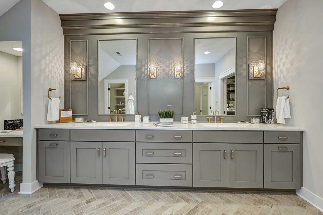 Gray bathroom cabinets – Austin Forest Edge Model Home
