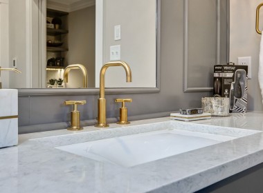Brass faucet, marble counter – Stone Shower – Austin Forest Edge Model Home