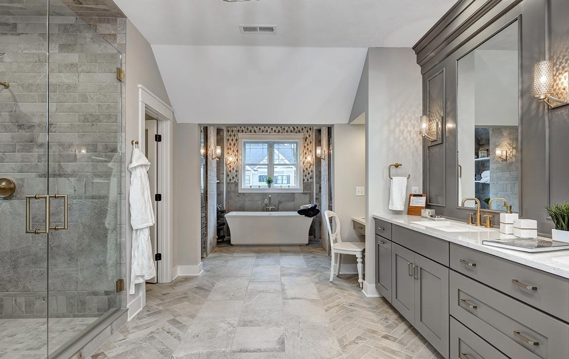 Austin Model Home at Forest Edge, Cranberry, PA, Luxury Bath, stone and marble and gray cabinets – Infinity Custom Homes