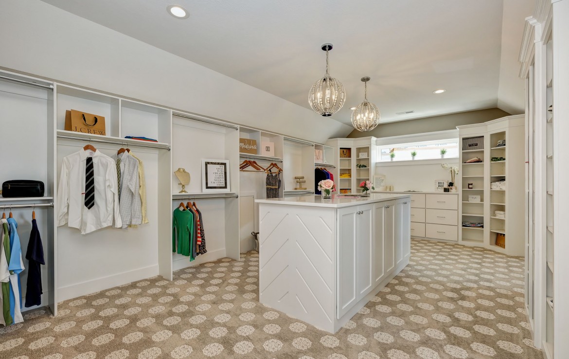 Nantucket Model Home, tudor style luxury home, master closet – Infinity Custom Homes
