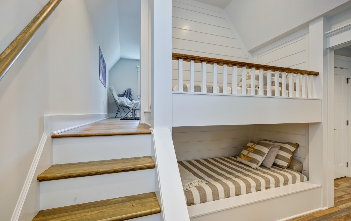 Nantucket Model Home, tudor style luxury home, children bedroom, builtin beds – Infinity Custom Homes