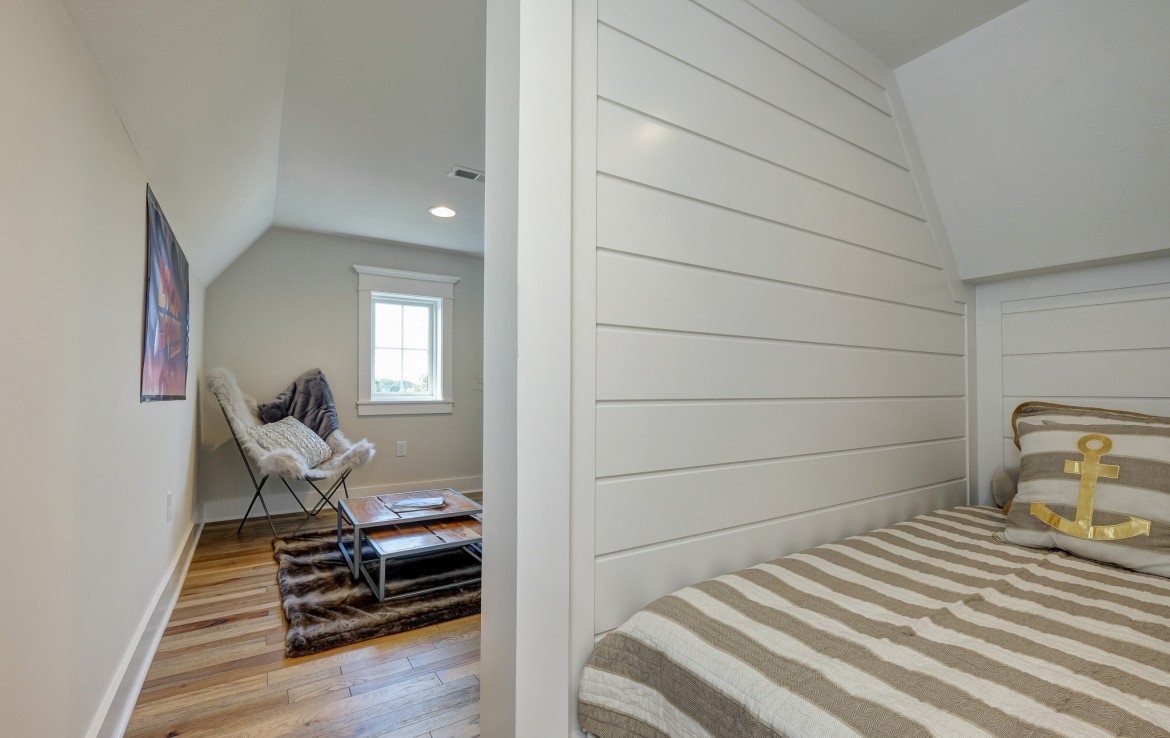 Nantucket Model Home, tudor style luxury home, kids bedroom, shiplap wall – Infinity Custom Homes