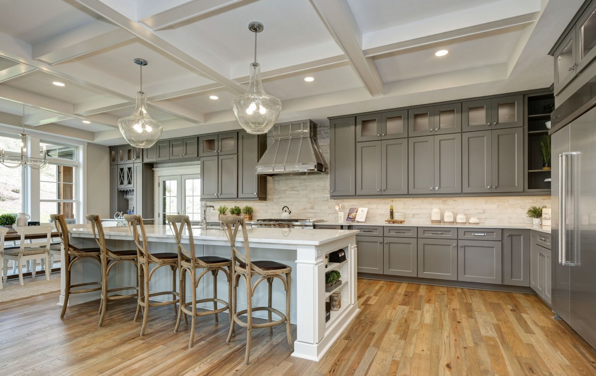 Nantucket Model Home, tudor style luxury home, farmstyle kitchen with gray cabinets – Infinity Custom Homes