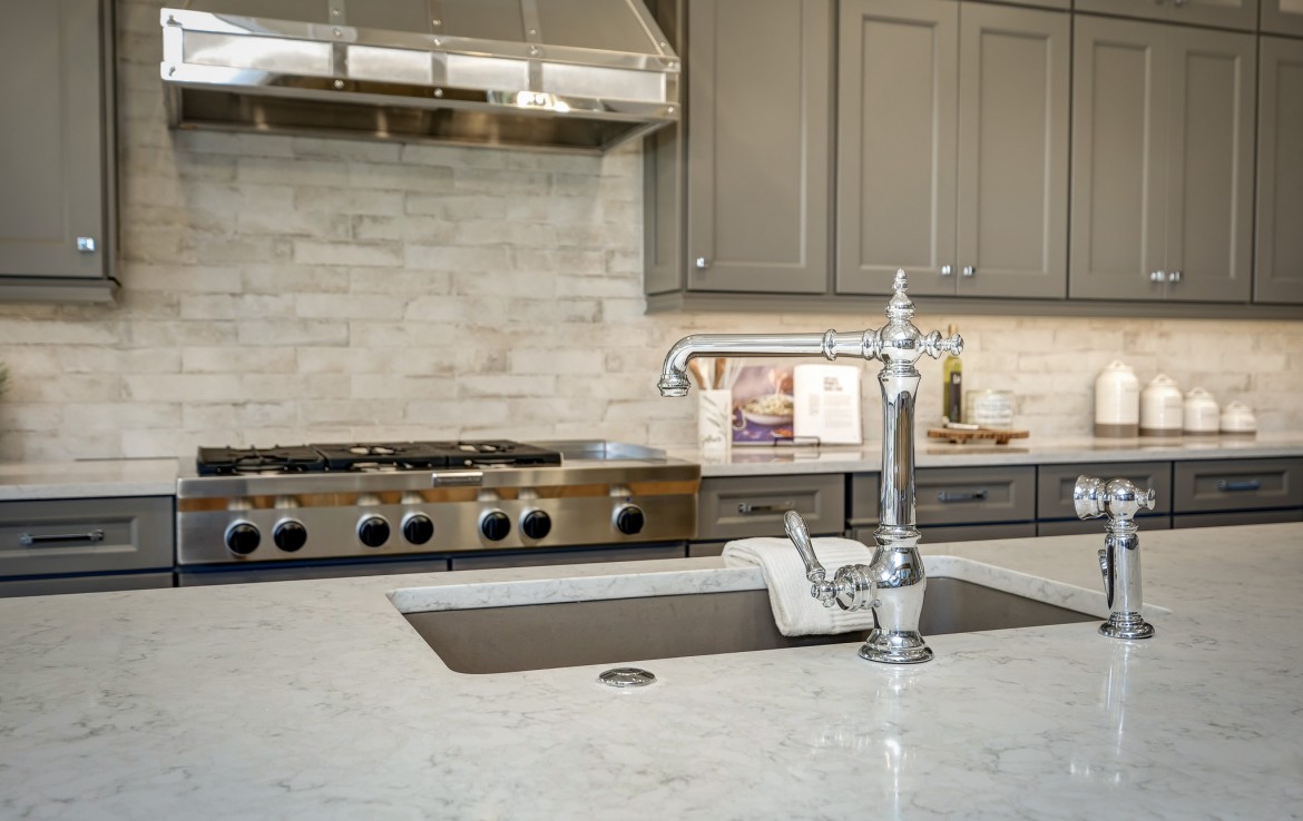 Nantucket Model Home, tudor style luxury home, kitchen island – Infinity Custom Homes