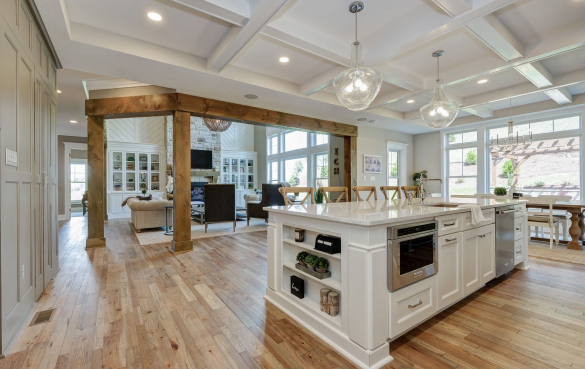 Nantucket Model Home, tudor style luxury home, open kitchen and family room– Infinity Cust