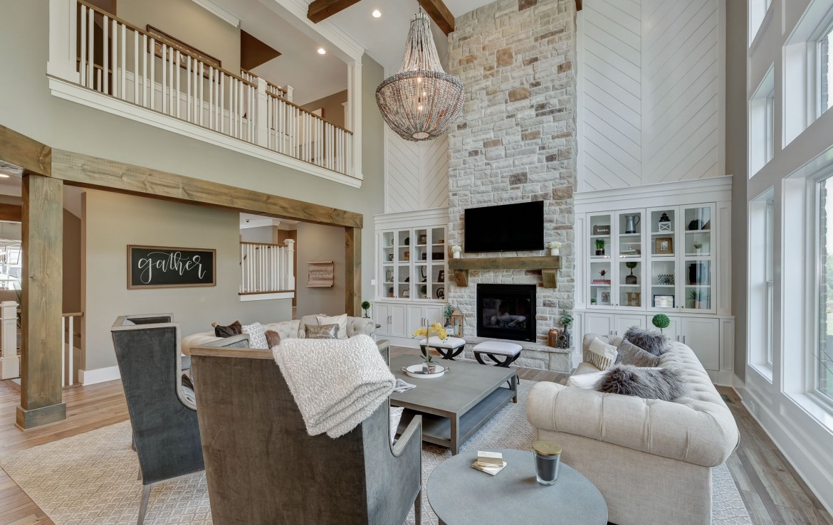 Nantucket Model Home, tudor style luxury home, family room– Infinity Cust