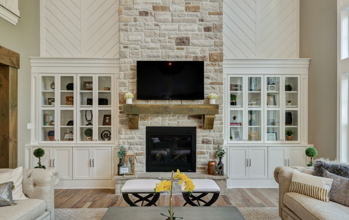 Nantucket Model Home, tudor style luxury home, stone fireplace, shiplap wall and builtins – Infinity Cust