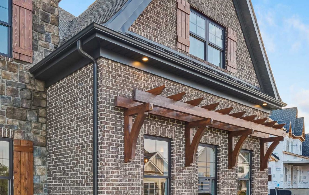 Nantucket Model Home, tudor style luxury home, exterior detail – Infinity Cust