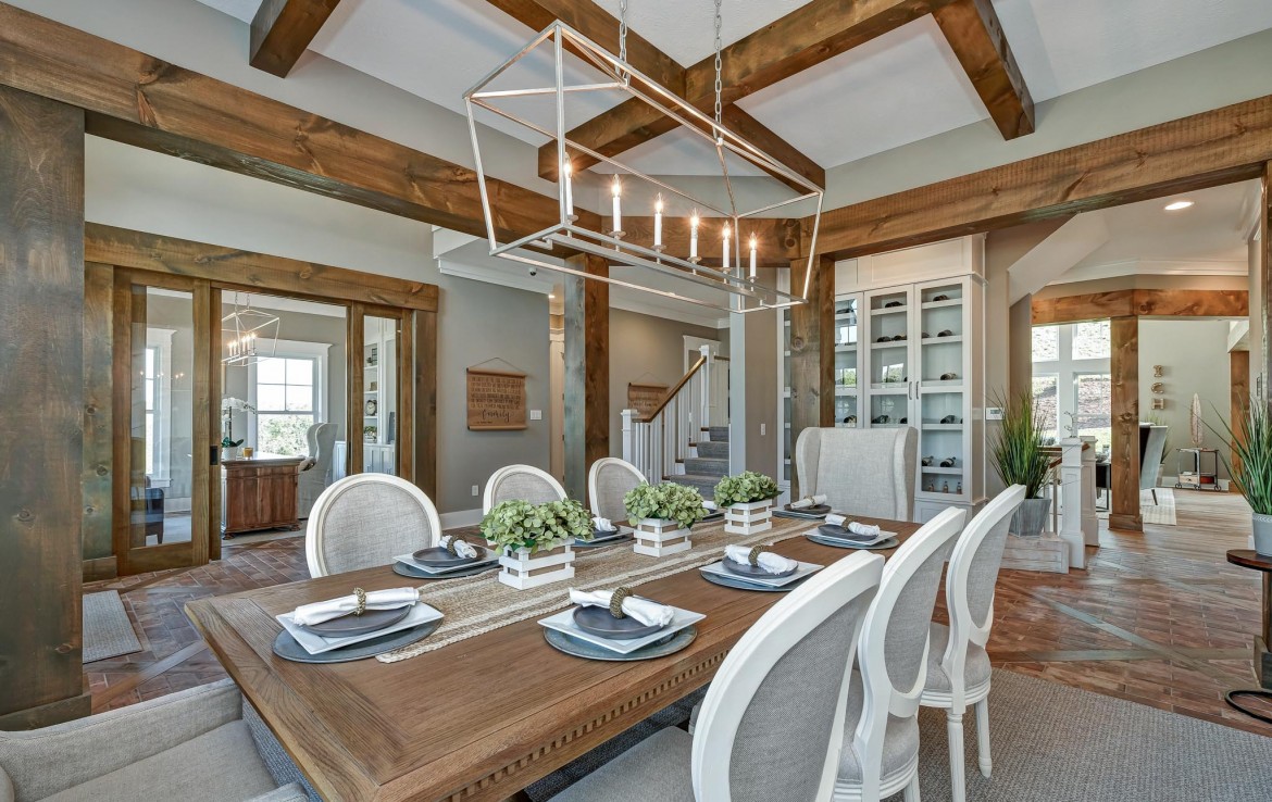 Nantucket Model Home, tudor style luxury home, dining room and wood work detail on ceiling – Infinity Cust