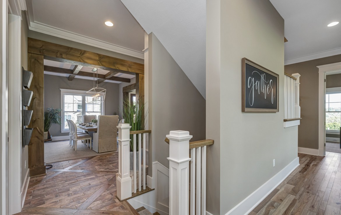 Nantucket Model Home, tudor style luxury home, dining room – Infinity Custom Homes