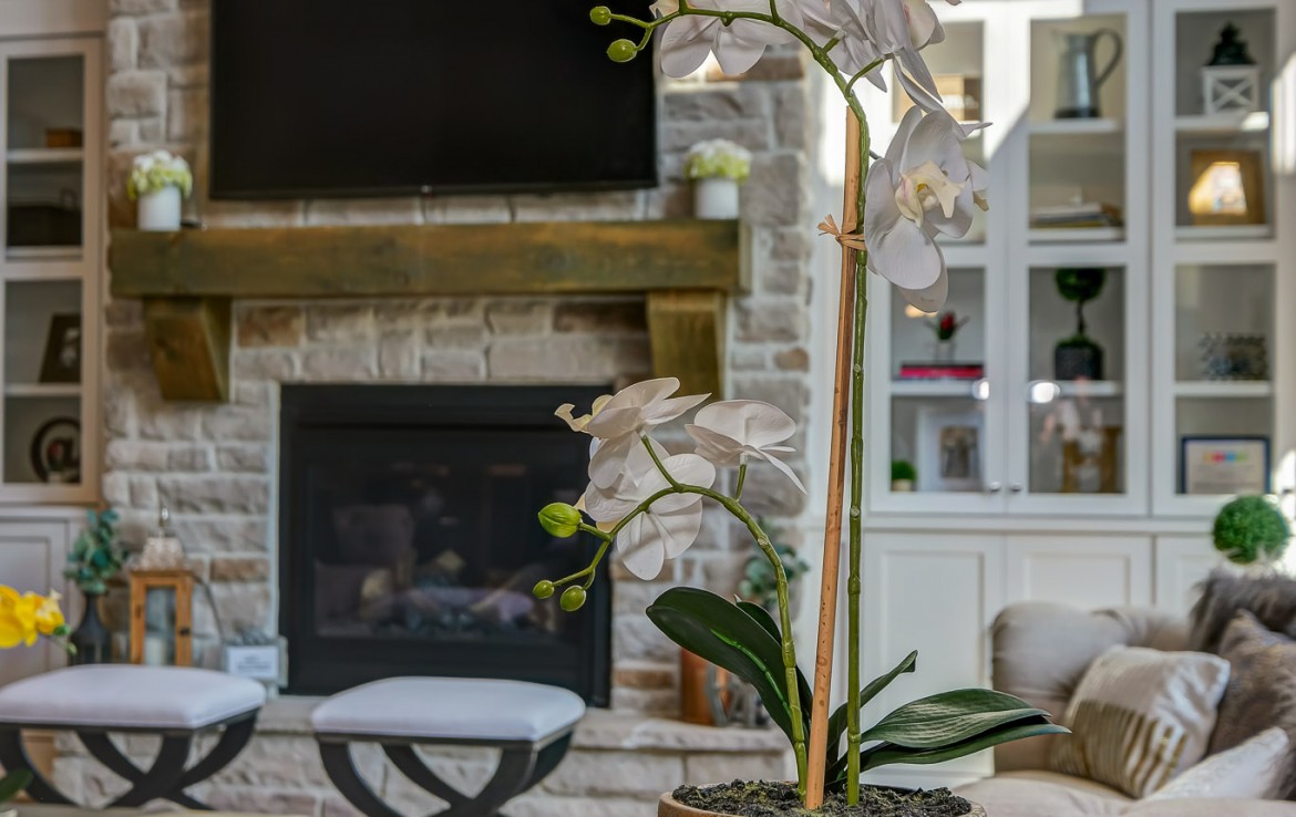Nantucket Model Home, tudor style luxury home, stone fireplace – Infinity Custom Homes