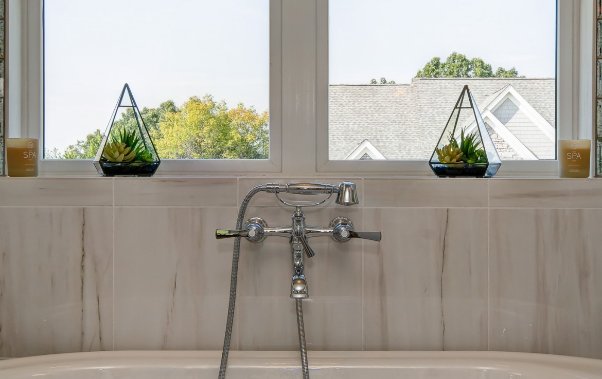 Nantucket Model Home, tudor style luxury home, master bathroom bathtub – Infinity Custom Homes