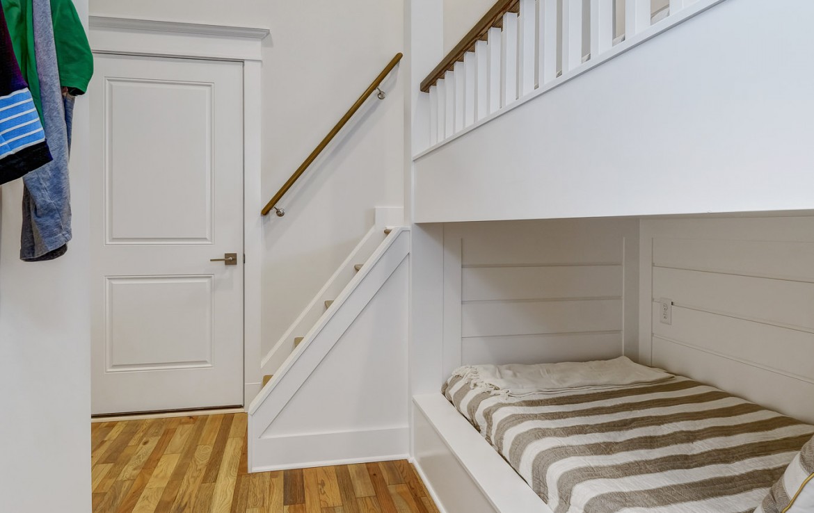 Nantucket Model Home, tudor style luxury home, kids bedroom builtin bunk beds – Infinity Custom Homes