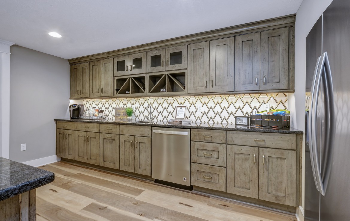 Nantucket Model Home, tudor style luxury home, lower level kitchen – Infinity Custom Homes