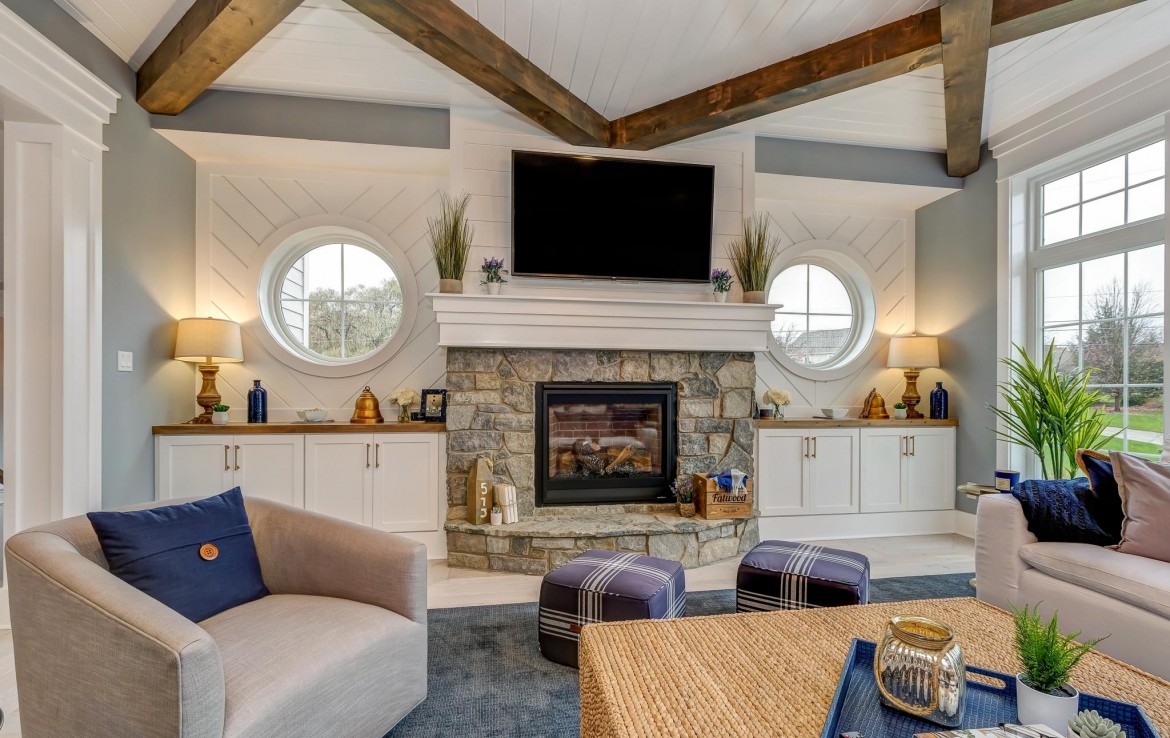 Portland Model Home, beach style luxury home in Mars PA, stone fireplace with white builtins – Infinity Custom Homes