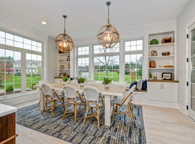 Portland Model Home, beach style luxury home in Mars PA, kitchen dining area with white builtins – Infinity Custom Homes