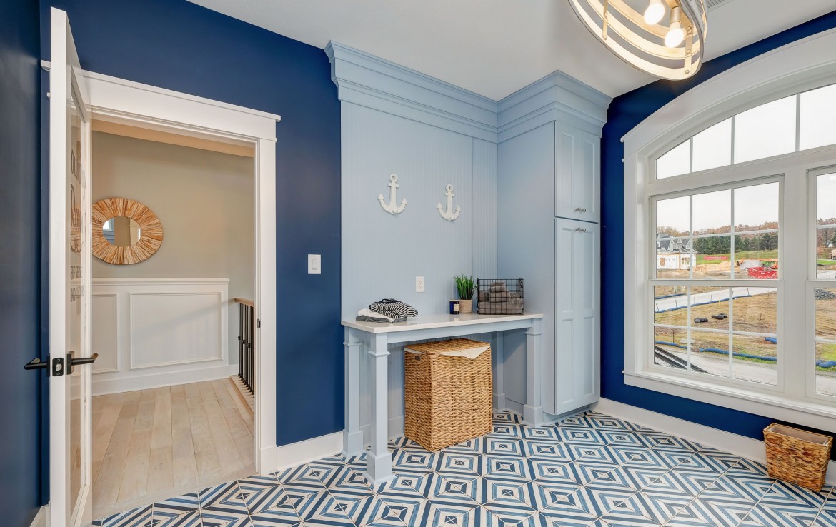 Portland Model Home, beach style luxury home in Mars PA, main floor laundry room – Infinity Custom Homes
