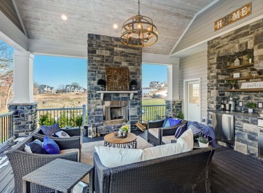 Portland Model Home, beach style luxury home in Mars PA, outdoor area with fireplace – Infinity Custom Homes