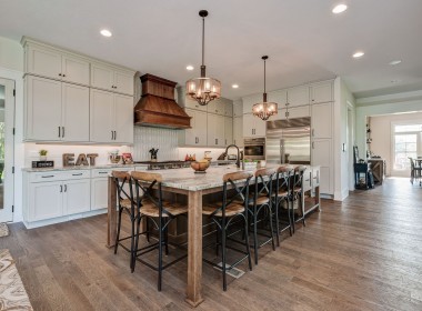 Portland floorplan, luxury single family home in Pittsburgh, PA, kitchen light gray cabinets, white tile, wood accents, black hardware – Infinity Custom Homes
