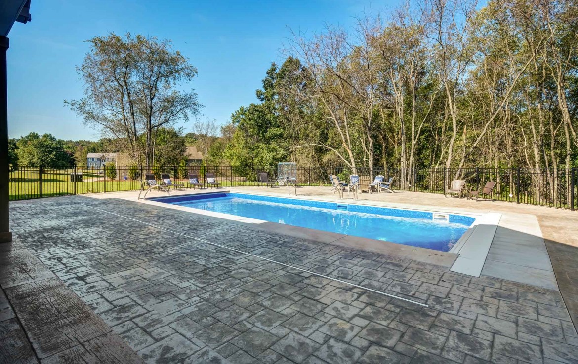 Portland floorplan, luxury single family home in Pittsburgh, PA, stone patio and pool – Infinity Custom Homes